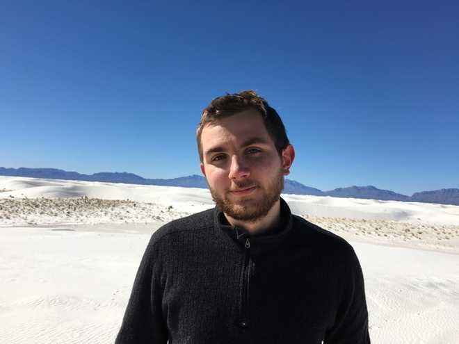 Unshaved and surrounded by white at White Sands National Monument