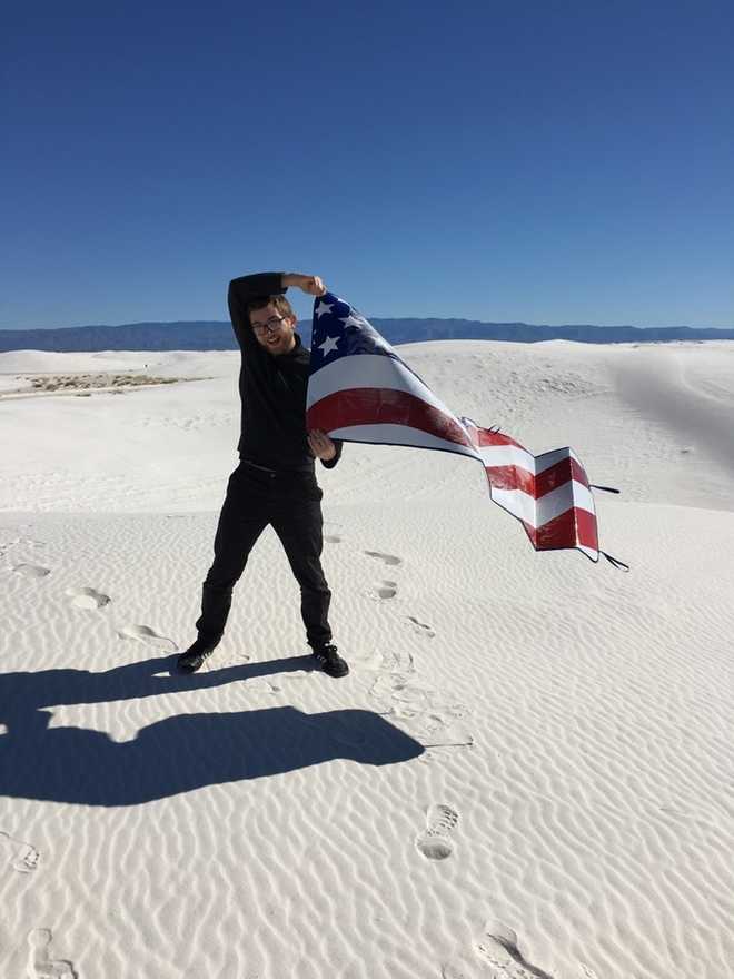 Preparing the sled for a trip down the dunes